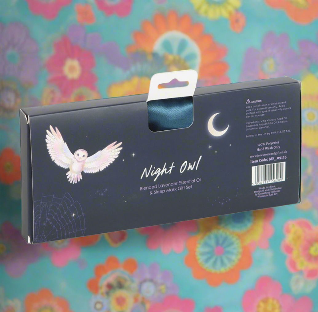 Luxurious satin sleep mask with a night owl and crescent moon design alongside a 10ml bottle of lavender essential oil in the Night Owl Sleep Mask and Essential Oil Gift Set for a peaceful bedtime routine.