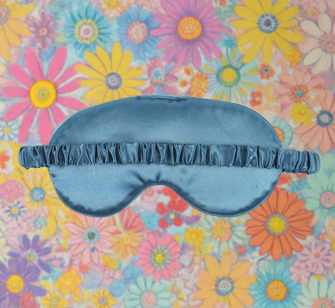 Elegant Night Owl Sleep Mask and Essential Oil Gift Set showcasing a light-blocking satin mask adorned with an owl, paired with lavender essential oil for enhanced relaxation and restful sleep