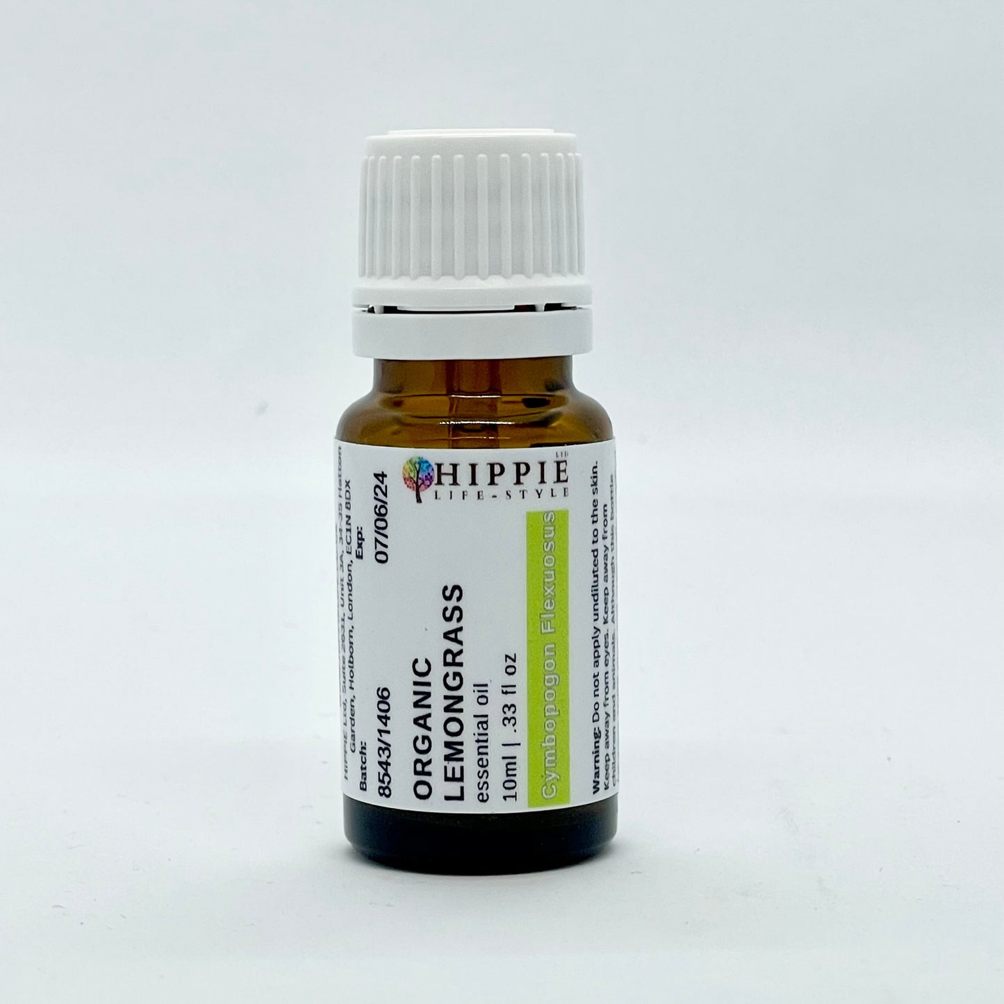 A 10ml bottle of organic, pure and therapeutic Lemongrass essential oil, from a U.K supplier in a professional therapist setting.