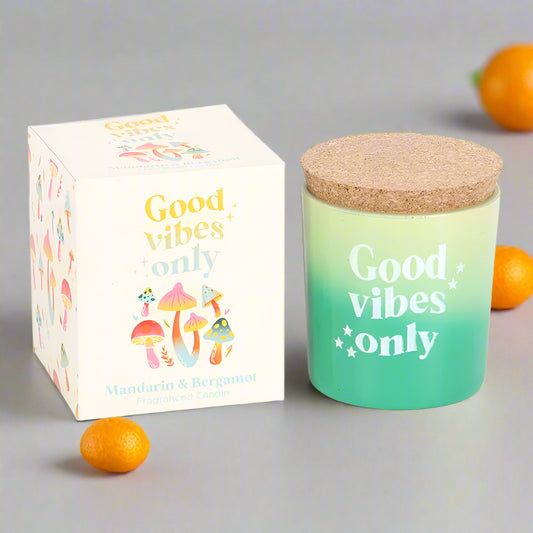 Good vibes only funky mushroom candle with bergamot and mandarin fragrance, pictured with both lid and colorful gift box