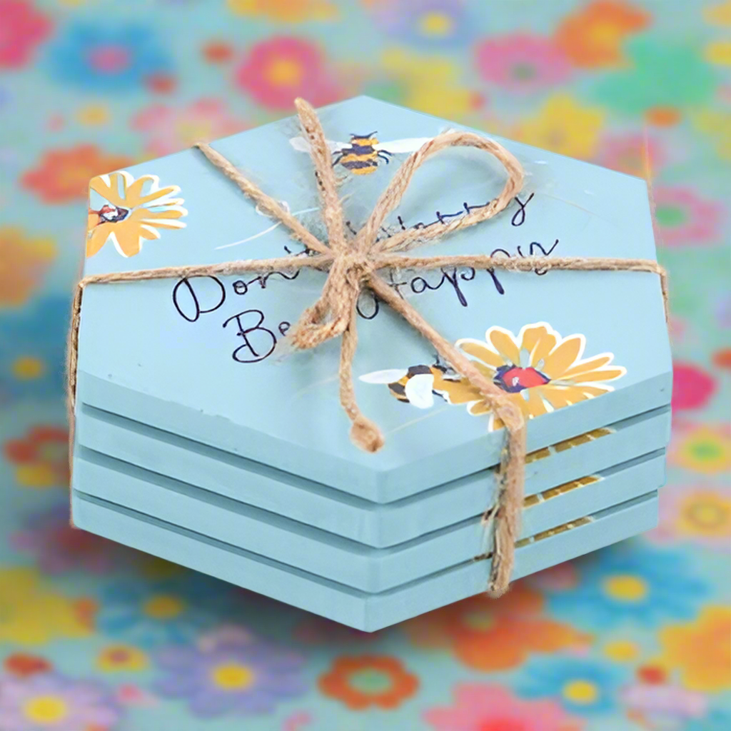 "Don't Worry Bee Happy" Coaster Set: A Touch of Cheer for Your Home