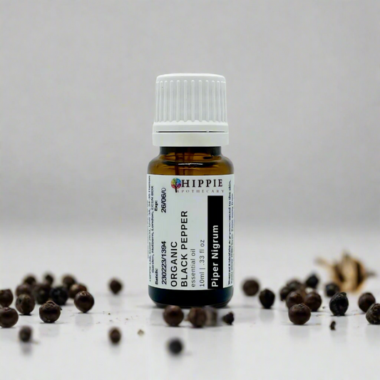organic essential oil from the UK and black pepper in professional therapist photo.