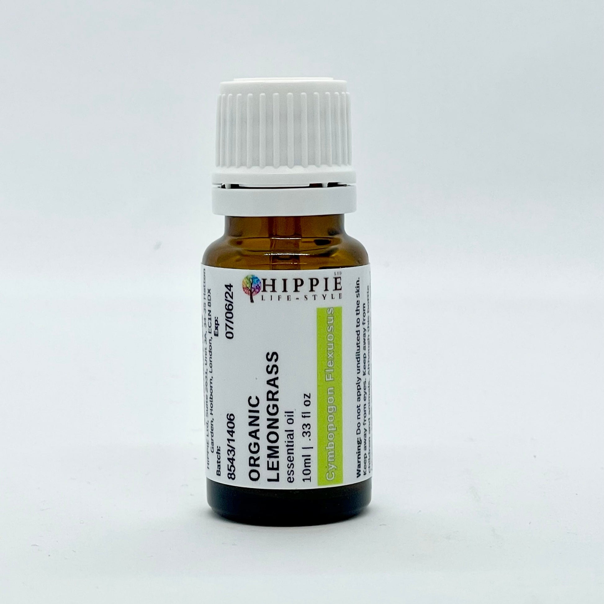 A 10ml bottle of organic, pure and therapeutic Lemongrass essential oil, from a U.K supplier in a professional therapist setting.